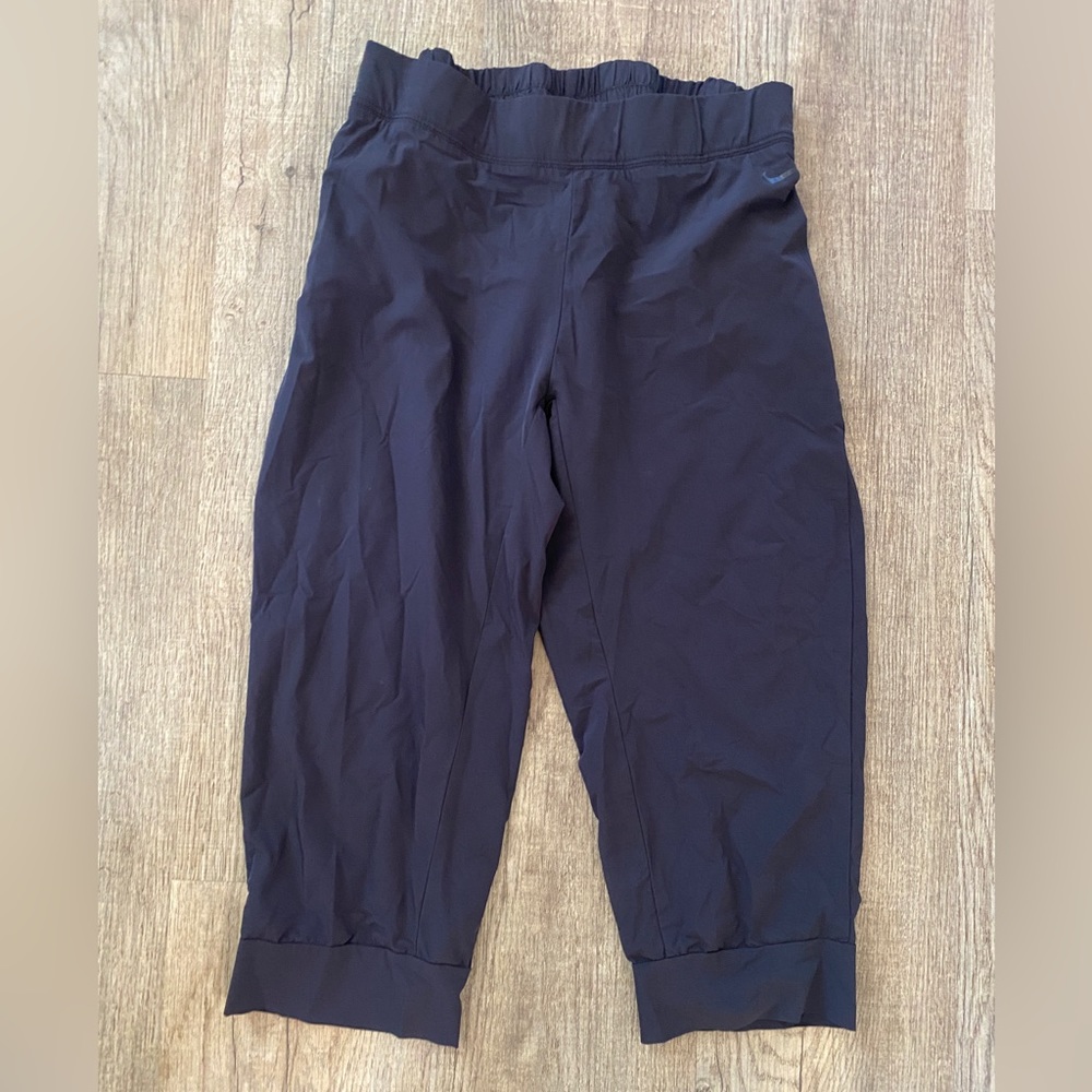 Nike Dri-Fit 80% nylon 20% spandex capri blaxk pants.  Excellent Condition